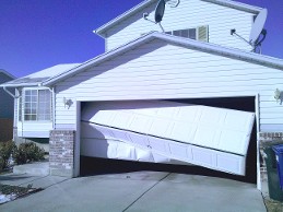 Badly Damaged Garage Door in McKinney, TX